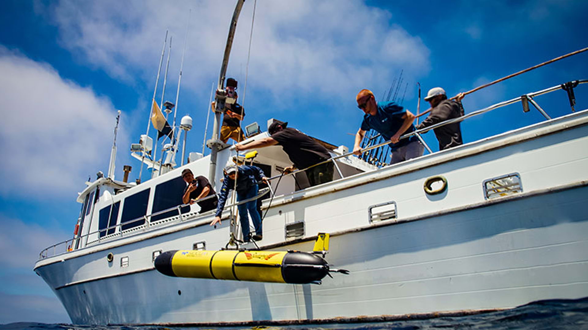 Lowering an underwater glider into the ocean