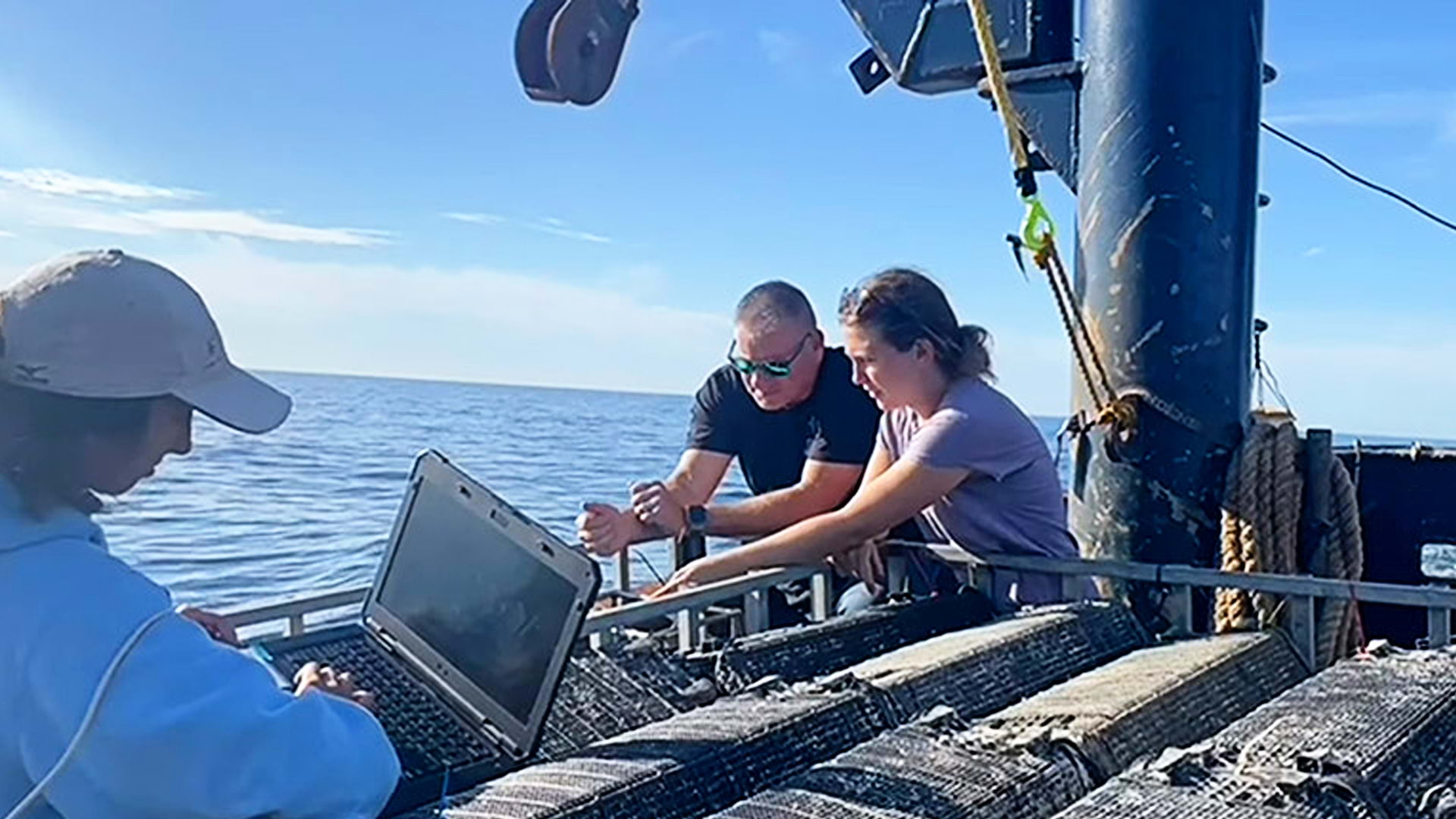 Photo of researchers on the open ocean