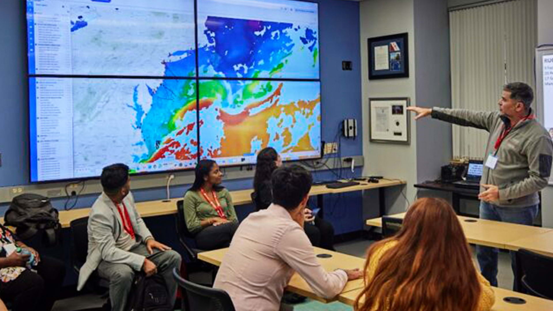 Josh Kohut pointing to image displayed on screen